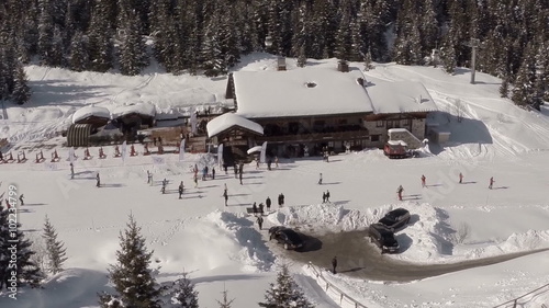 Aerial shot of people skiing in a french ski resort in the Alps
 photo