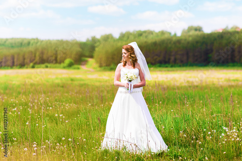 Lovely bride outdoors in a forest