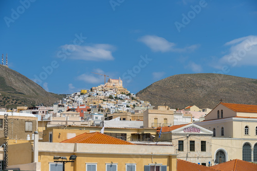 Traditional buildings on a sunny day in Syros island, Greece. © inbulb1