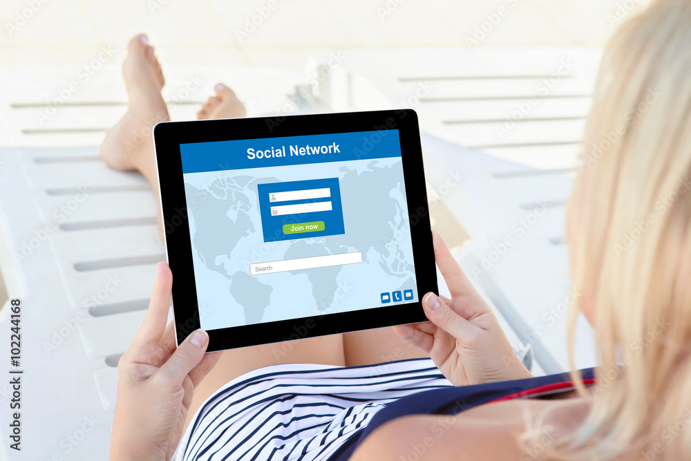 girl in bathing suit with computer tablet and social network girl in bathing suit with computer tablet and social network