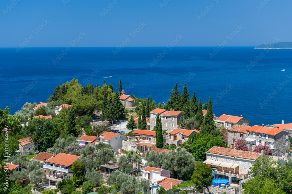 Traditional architecture village on the hill and Adriatic sea view. Bar, Montenegro.