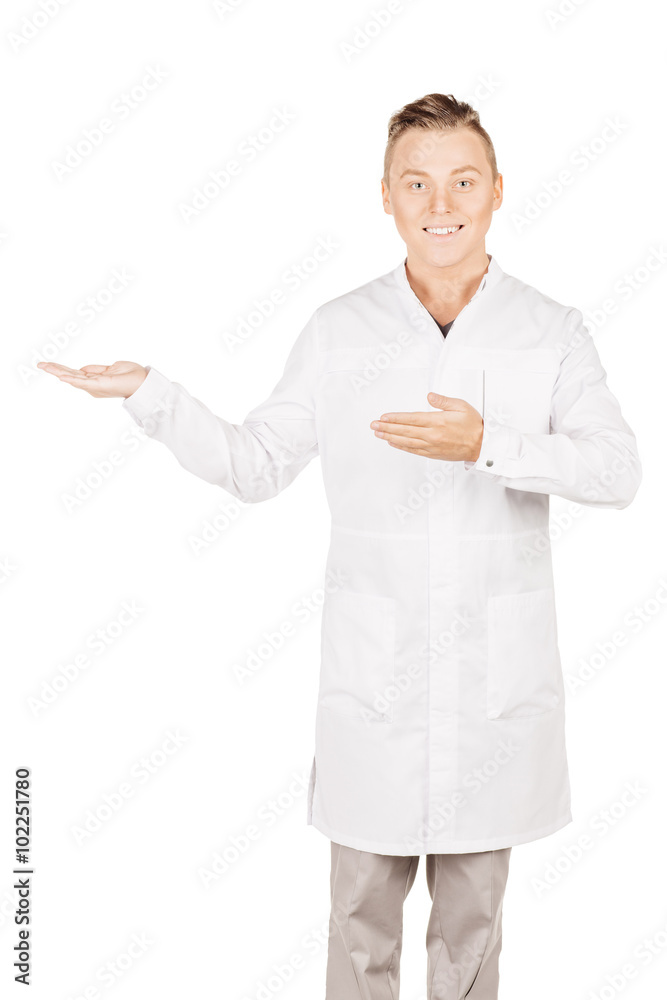 Medical doctor in white coat with stethoscope holding something
