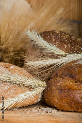 f bread with cereals on a fabric background brown color. photo