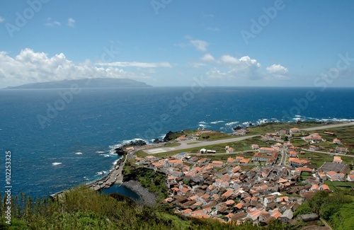Vista da Ilha das Flores a partir da ilha do Corvo. Açores, Portugal photo