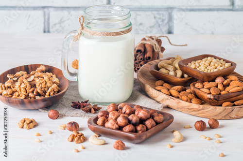 Vegan milk from nuts in glass jar