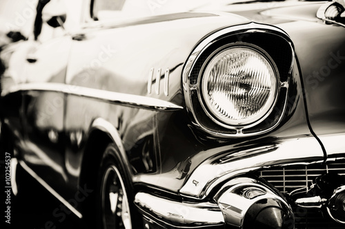 Photograph of a classic vehicle with close-up on headlights. © Mariusz Blach