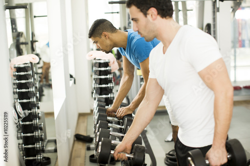 Young men training in the gym