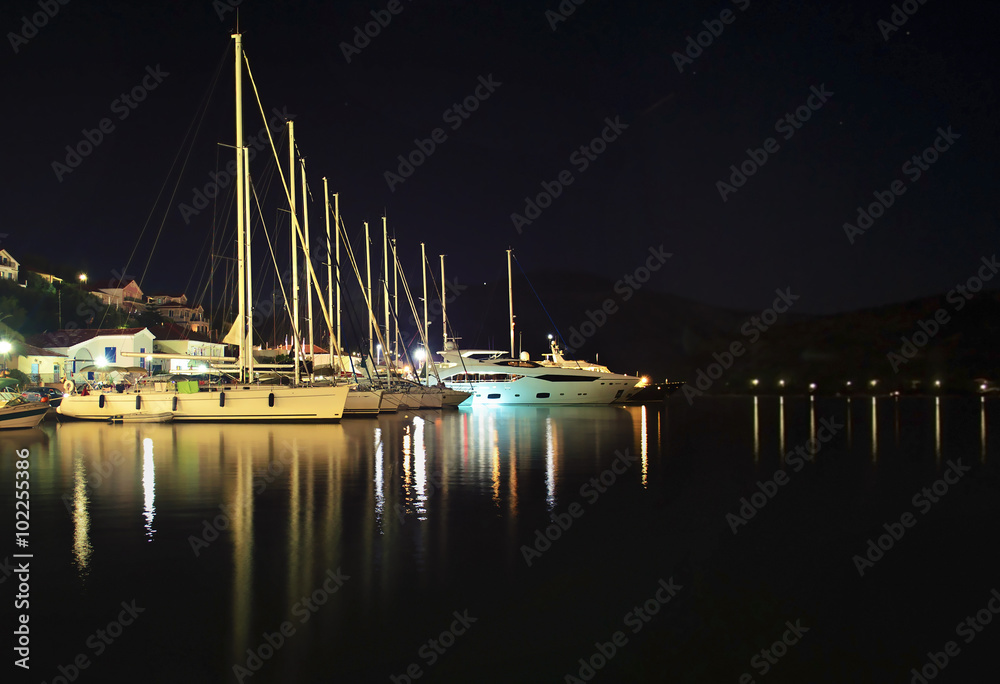 night photography of sailboats at Ithaca island Greece - long exposure photography  