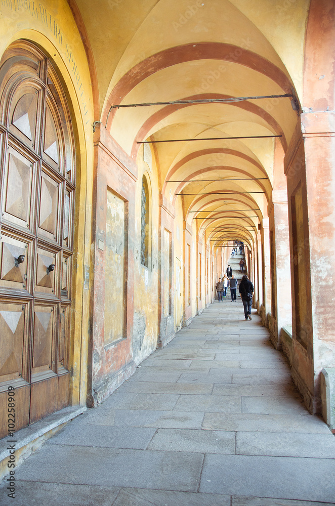orange arcades that lead to the sanctuary of San Luca in bologna