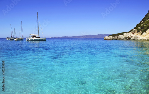 sailboats in turquoise sea of Ithaca Ionian islands Greece