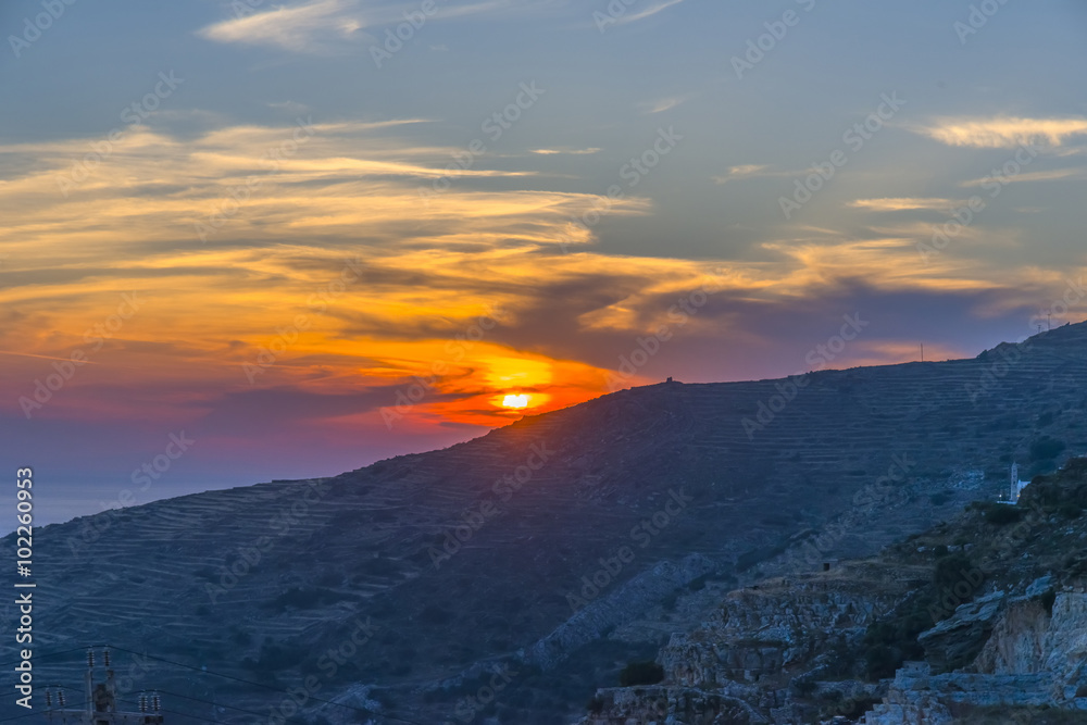 Amazing sunset in Mykonos, Greece.