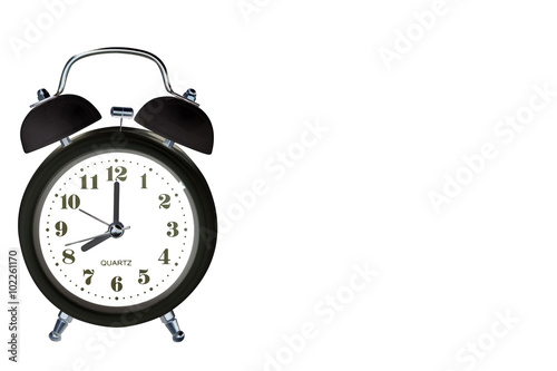 Black classic alarm clock on white background