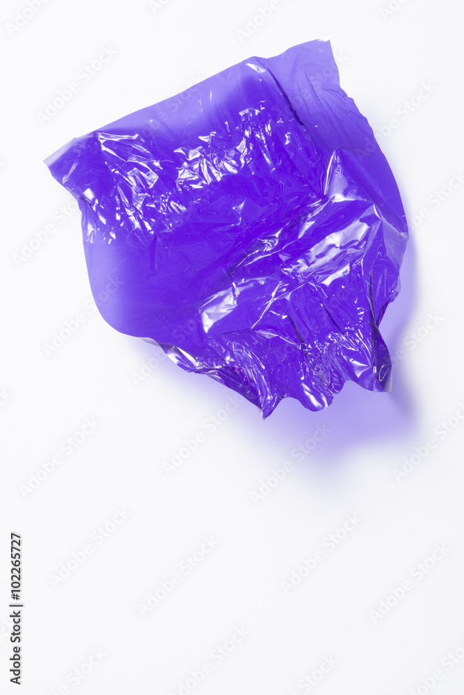 Fototapeta premium Crinkled purple sweet wrapper