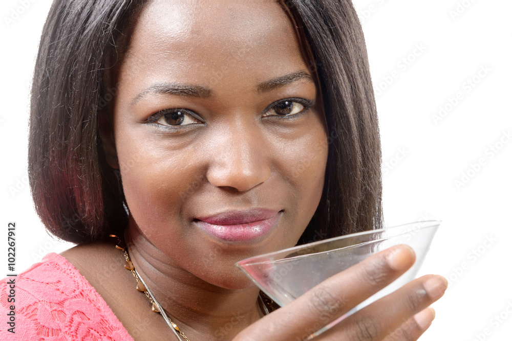 beautiful African woman drinking orange juice beautiful African woman drinking orange juice