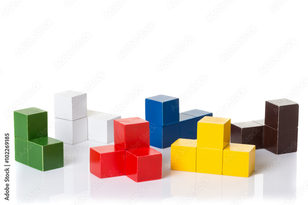 Multi colored wooden blocks, logic puzzle Multi colored wooden blocks, logic puzzle