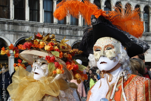 italy, venice. carnival masks posing in san marco square © doryx