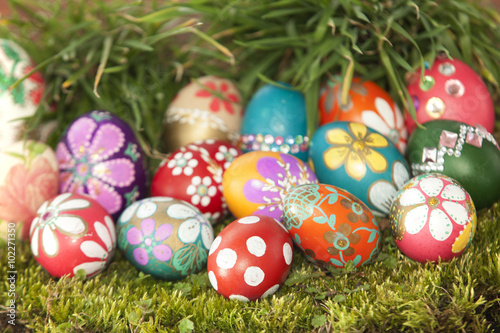 Colourful easter eggs on grass