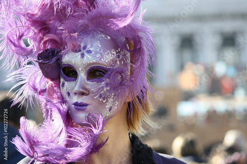 Fototapeta Naklejka Na Ścianę i Meble -  Carnival mask in Venice posing in San Marco square