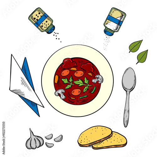 Bowl of hot soup with bread and condiments