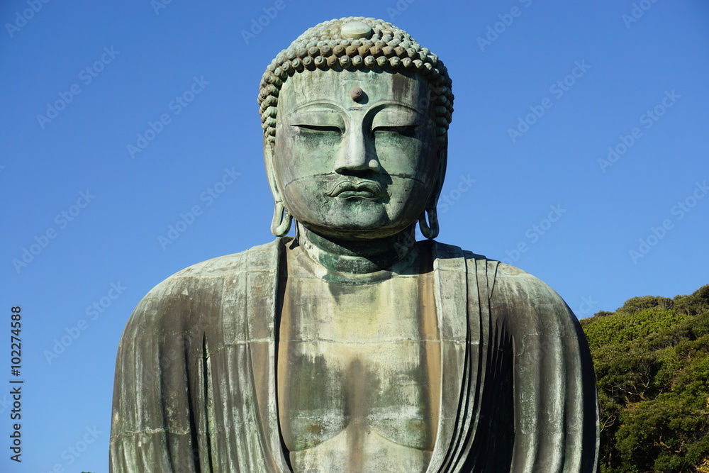 The Great Amida Buddha of Kamakura (Daibutsu) in the Kotoku-in Temple The Great Amida Buddha of Kamakura (Daibutsu) in the Kotoku-in Temple