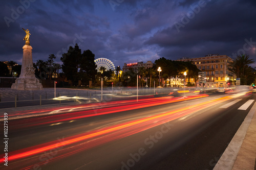 France, Nice, 2016.01.21: Monument Centennial, Promenade des Anglais, traffic, long exposure, Great wheel on the place Massena (Massena square),  © Vladimir Drozdin