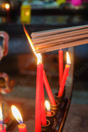 Buring incenses to worship the ancestors