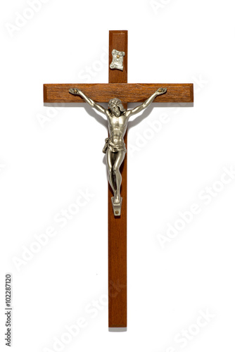 Fotobehang Plain wooden crucifix with silver figure of Christ