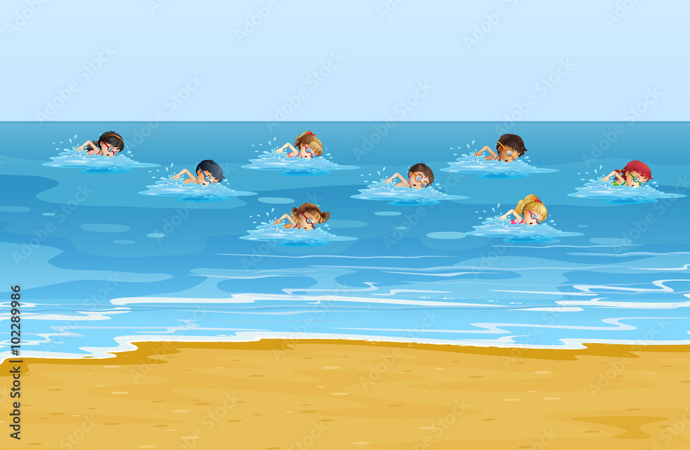 Obraz premium Boys and girls swimming in the ocean