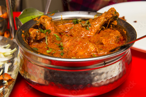 Indian spicy Curry called Chicken Masala photo