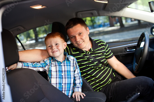 Father and son in the car.
