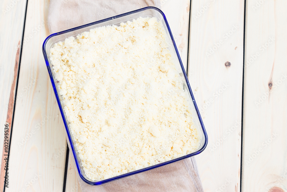 Process of Preparation Crumble with Berries on Light White Wooden Background, Horizontal, Top View Process of Preparation Crumble with Berries on Light White Wooden Background, Horizontal, Top View