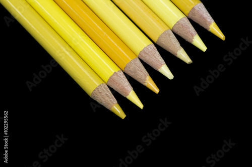 7 Yellow Pencils - Black Background