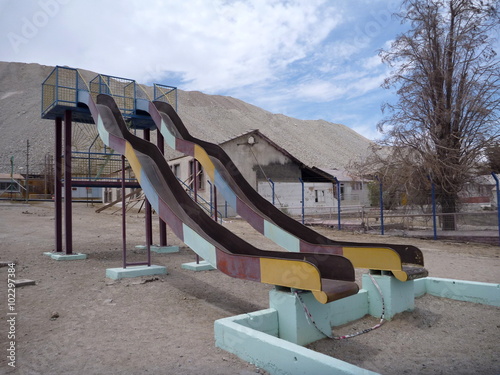 abandoned playground in chuquicamata city photo