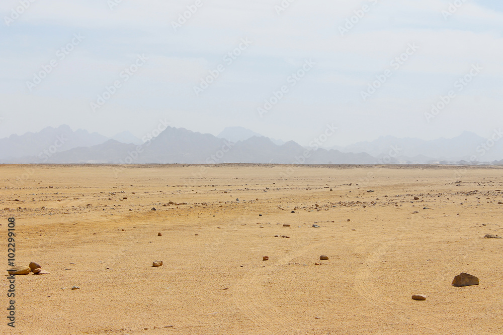 Egyptian Desert, Sand And Sky, Mountains In Background