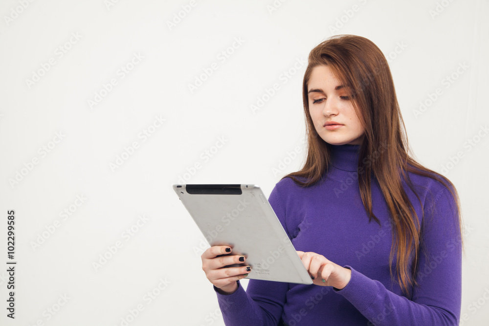 Teen with tablet pc, white background Teen with tablet pc, white background