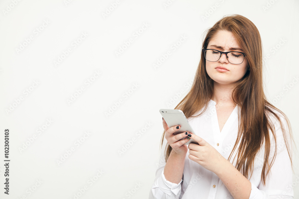Attractive businesswoman using smart phone Attractive businesswoman using smart phone