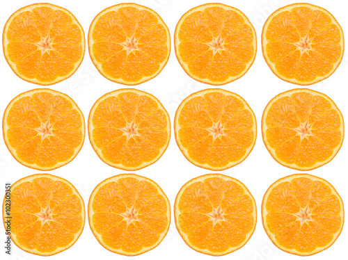 Sliced Orange Layed out in a decrotive pattern photo