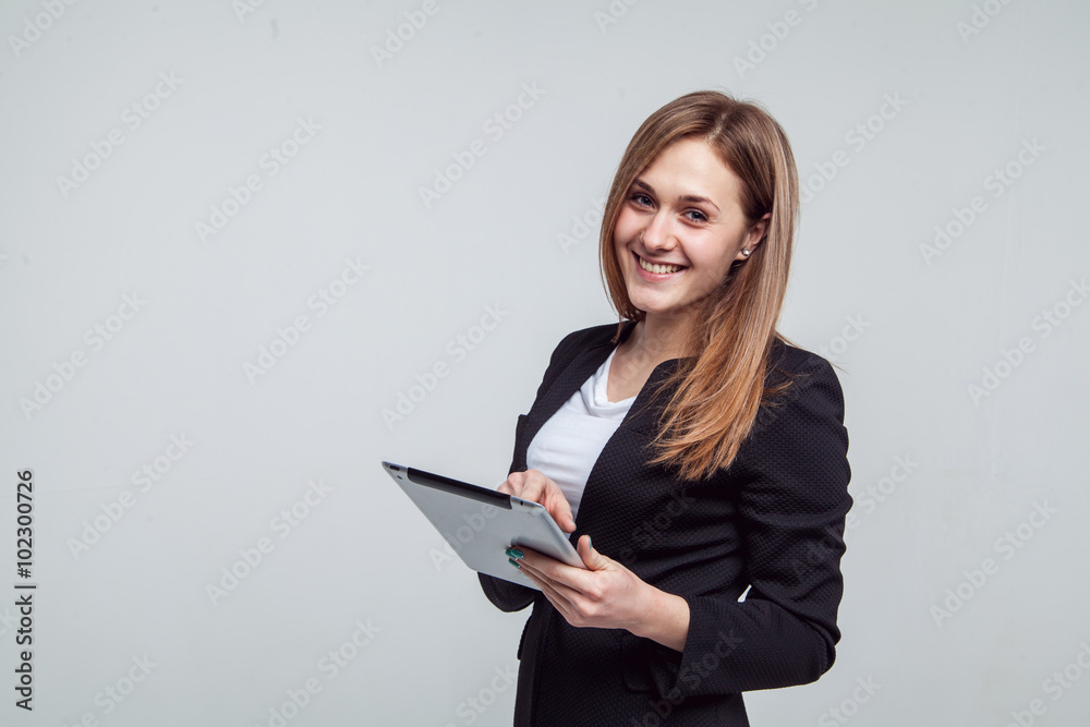 Smiling Businesswoman Holding Digital Tablet. Isolated On White Smiling Businesswoman Holding Digital Tablet. Isolated On White