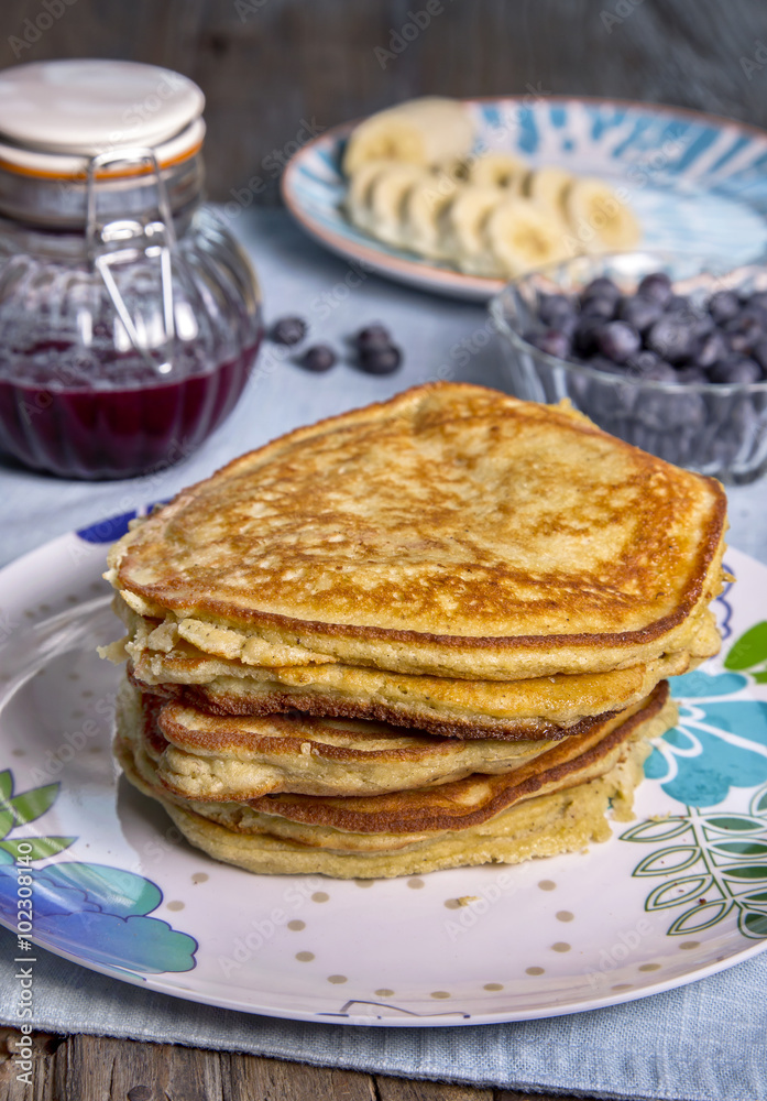 Pancakes with jam, berries and bananas Pancakes with jam, berries and bananas