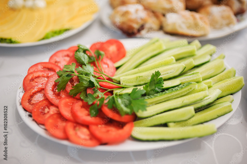 Tasty appetizer. tomatoes with cucumber Tasty appetizer. tomatoes with cucumber