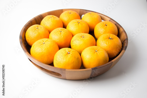 Oranges fruit, half of orange, orange isolated and basket with a lot of oranges