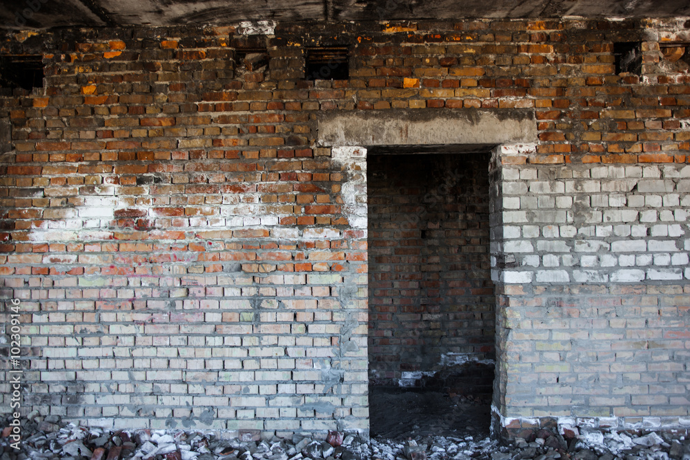 Door aperture inside the old ruined brick building Door aperture inside the old ruined brick building