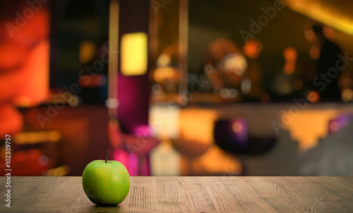 apple on table in a night club