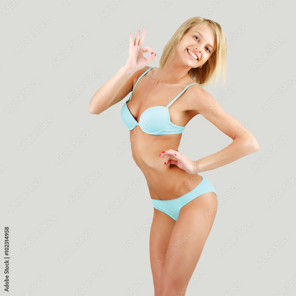 Naklejka premium woman in underwear showing slimming concept