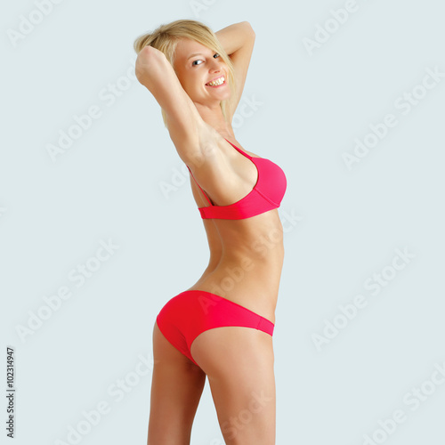 Smiling woman with beautiful body