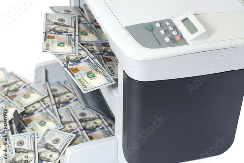 Printer printing fake dollar bills isolated on white background photo