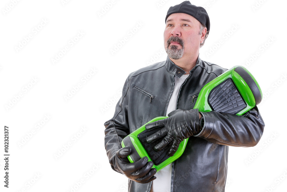 Serious man in leather holding his hoverboard Serious man in leather holding his hoverboard