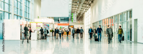 blurred people at a trade fair