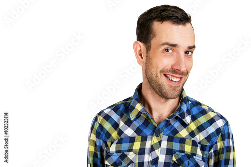 Happy young man. Portrait of handsome young man in casual shirt