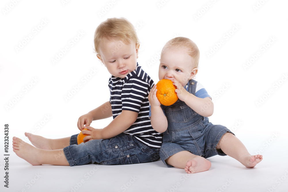 little boys with orange little boys with orange